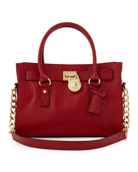 Michael Kors red satchels